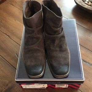 Brown suede distressed booties.